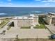 Aerial view of building and beachfront at 2294 Ocean Shore Blvd # 401, Ormond Beach, FL 32176