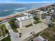 Aerial view showcasing building and parking at 2294 Ocean Shore Blvd # 401, Ormond Beach, FL 32176