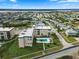 Aerial view of coastal condo complex with pool and ocean access at 2294 Ocean Shore Blvd # 401, Ormond Beach, FL 32176
