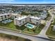 Aerial view of condo building with pool and ocean views at 2294 Ocean Shore Blvd # 401, Ormond Beach, FL 32176
