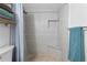 Updated bathroom with tiled shower and built-in seat at 2294 Ocean Shore Blvd # 401, Ormond Beach, FL 32176