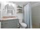 Small bathroom with single vanity and shower/tub combo at 2294 Ocean Shore Blvd # 401, Ormond Beach, FL 32176