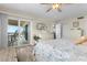 King bedroom with balcony access and ocean view at 2294 Ocean Shore Blvd # 401, Ormond Beach, FL 32176