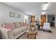Comfortable common area with seating and large windows at 2294 Ocean Shore Blvd # 401, Ormond Beach, FL 32176