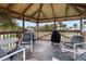 Relaxing covered patio with grill at 2294 Ocean Shore Blvd # 401, Ormond Beach, FL 32176
