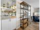 Hallway with built-in shelving and mirror at 2294 Ocean Shore Blvd # 401, Ormond Beach, FL 32176