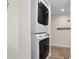 Stackable washer and dryer in convenient laundry room at 2294 Ocean Shore Blvd # 401, Ormond Beach, FL 32176