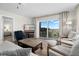 Bright living room with ocean view and access to bedroom at 2294 Ocean Shore Blvd # 401, Ormond Beach, FL 32176