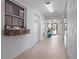 Bright and airy lobby with tile floors and access to building exterior at 2294 Ocean Shore Blvd # 401, Ormond Beach, FL 32176