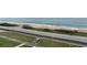 Peaceful ocean view with beach and road visible at 2294 Ocean Shore Blvd # 401, Ormond Beach, FL 32176