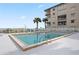 Refreshing community pool with ample deck space at 2294 Ocean Shore Blvd # 401, Ormond Beach, FL 32176
