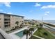 View of the community pool from a condo balcony at 2294 Ocean Shore Blvd # 401, Ormond Beach, FL 32176