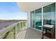 Balcony offering scenic views and access to sliding doors at 231 Riverside Dr # 701, Holly Hill, FL 32117