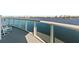 Covered balcony with water views and seating at 231 Riverside Dr # 701, Holly Hill, FL 32117