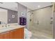 Bathroom with a walk-in shower and modern vanity at 231 Riverside Dr # 701, Holly Hill, FL 32117