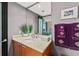 Vanity with a large mirror and plenty of counter space at 231 Riverside Dr # 701, Holly Hill, FL 32117