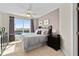 Bright bedroom with a king-size bed and city views at 231 Riverside Dr # 701, Holly Hill, FL 32117