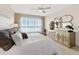 Bedroom with king bed and decorative mirror at 231 Riverside Dr # 701, Holly Hill, FL 32117