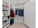 Well-organized closet with shelving and hanging rods at 231 Riverside Dr # 701, Holly Hill, FL 32117