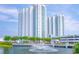 Luxury high rise building with water view and fountain at 231 Riverside Dr # 701, Holly Hill, FL 32117