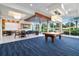 Relaxing game room with pool table and seating area at 231 Riverside Dr # 701, Holly Hill, FL 32117