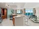 Modern kitchen with stainless steel appliances and breakfast bar at 231 Riverside Dr # 701, Holly Hill, FL 32117