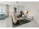 Relaxing living area featuring comfy recliners and a large TV at 231 Riverside Dr # 701, Holly Hill, FL 32117