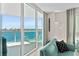 Stunning water view from living room with balcony access at 231 Riverside Dr # 701, Holly Hill, FL 32117