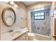 Clean bathroom with bathtub, shower, and updated vanity at 2332 Salem Dr, Deltona, FL 32738