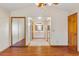 Bedroom with mirrored closet and en-suite bathroom at 2332 Salem Dr, Deltona, FL 32738