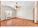 Large bedroom with hardwood floors and ceiling fan at 2332 Salem Dr, Deltona, FL 32738