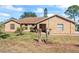 Brick ranch-style house with landscaping at 2332 Salem Dr, Deltona, FL 32738