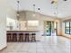 Bright kitchen with breakfast bar, ample counter space, and access to backyard at 2332 Salem Dr, Deltona, FL 32738