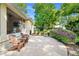 Relaxing patio with seating area, screened porch, and lush landscaping at 242 Westchester Dr, Deland, FL 32724