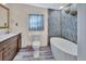 Bathroom with freestanding tub and unique tile at 24514 Snail Rd, Astor, FL 32102