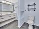 Double vanity bathroom with modern finishes at 24514 Snail Rd, Astor, FL 32102