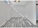 Spacious bedroom with wood-look flooring and ceiling fan at 24514 Snail Rd, Astor, FL 32102