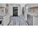 Modern kitchen featuring stainless steel appliances and granite countertops at 24514 Snail Rd, Astor, FL 32102