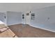Covered porch with door access and backyard view at 24514 Snail Rd, Astor, FL 32102