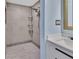 Large walk-in shower with modern tile at 24514 Snail Rd, Astor, FL 32102
