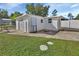 Detached storage shed with ample space at 24514 Snail Rd, Astor, FL 32102