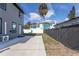 Large backyard with a patio and privacy fence at 311 Ora St, Daytona Beach, FL 32118