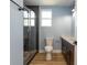 Modern bathroom with walk-in shower and updated vanity at 311 Ora St, Daytona Beach, FL 32118