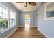 Bright bedroom with hardwood floors and large windows at 311 Ora St, Daytona Beach, FL 32118