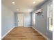 Light blue office with wood flooring and recessed lighting at 311 Ora St, Daytona Beach, FL 32118