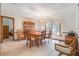 Dining room features a wood table and chairs, and a china cabinet at 315 Huntington Dr, Deland, FL 32724