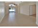 Dining room with tile floors and access to the kitchen at 3164 Wood Rose Way, Deltona, FL 32725