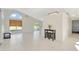Spacious living area with tile floors and access to other rooms at 3190 Lori Ct, Deltona, FL 32738