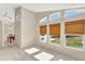 Open living room with vaulted ceiling and lots of natural light at 3190 Lori Ct, Deltona, FL 32738