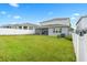 Spacious backyard with grassy area at 3404 Grassy Lake View Ave, Minneola, FL 34715